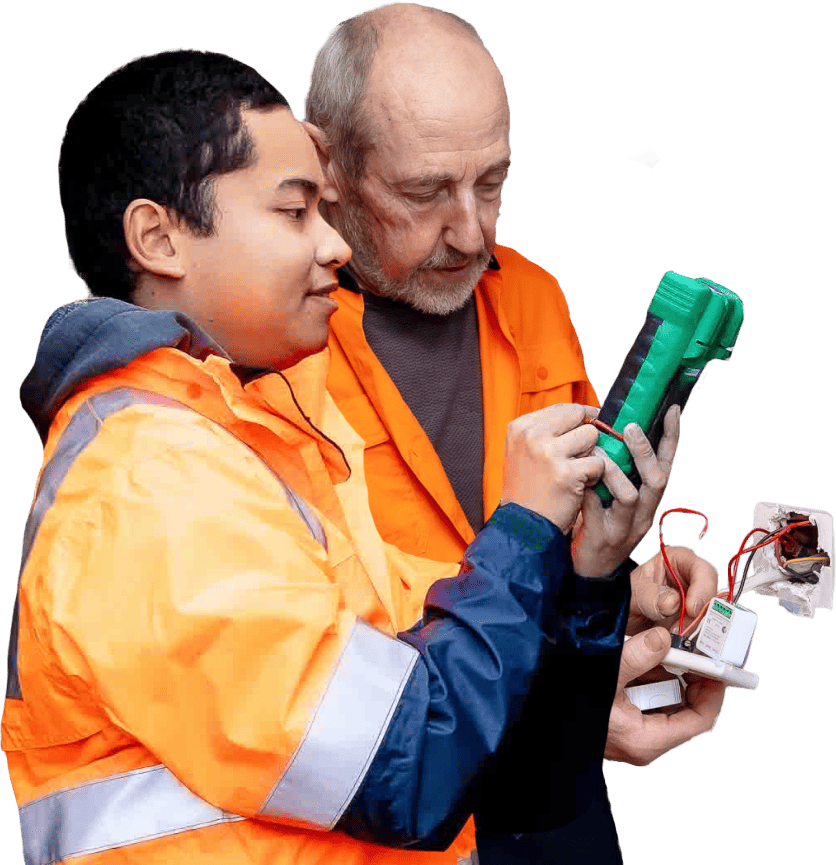 Two local electricians performing local electrical repairs: one calibrating, the other wiring a white device.